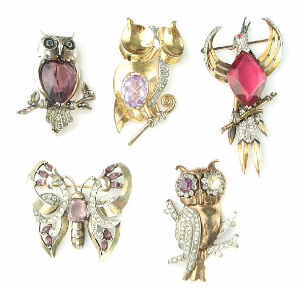 Appraisal: A collection of silver costume jewelry featuring five animal brooches