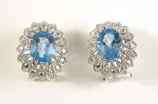 Appraisal: PAIR OF BLUE TOPAZ AND DIAMOND EARRINGS each k white