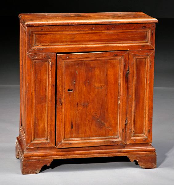 Appraisal: An Italian Baroque walnut cabinet th century The rectangular top