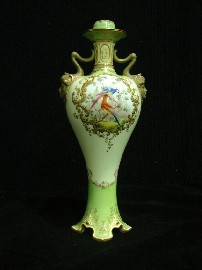 Appraisal: A Doulton Burslem twin handled vase and cover painted with