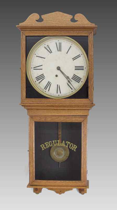 Appraisal: INGRAHAM OAK REGULATOR CLOCK Oak case paper over metal dial