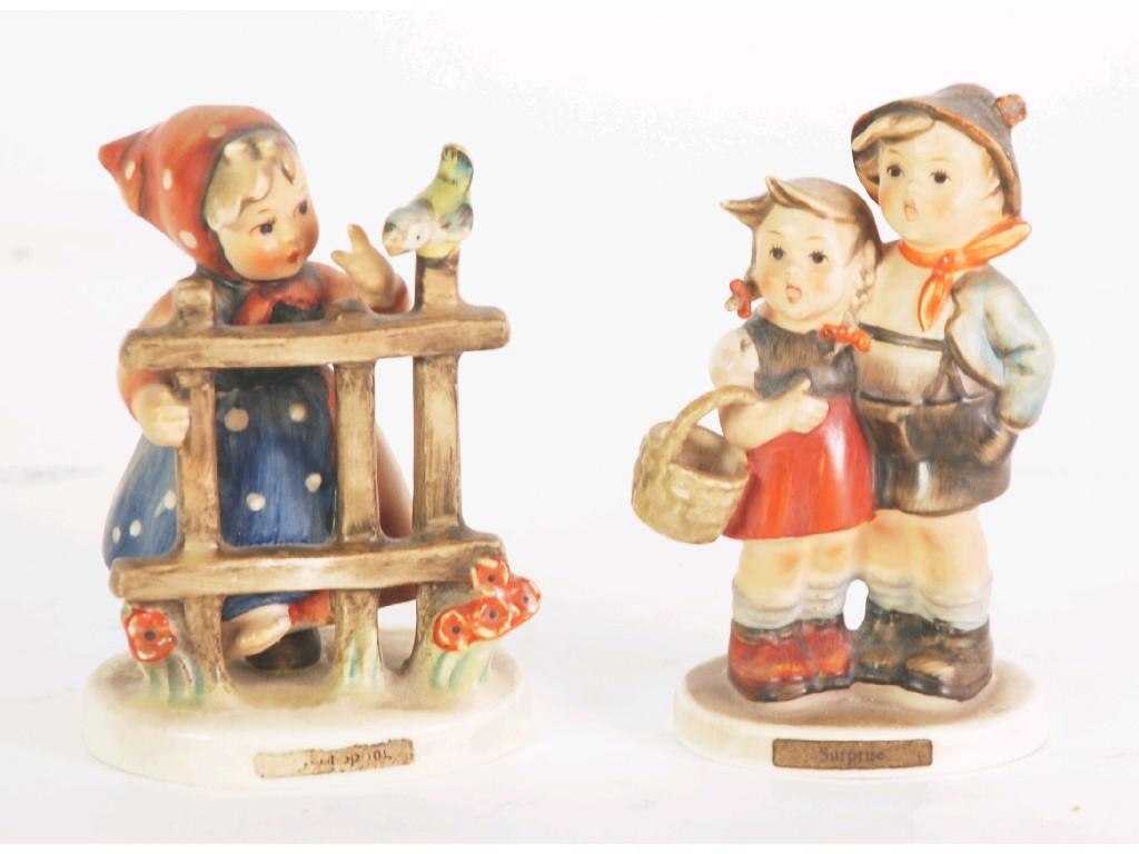 Appraisal: TWO HUMMEL POTTERY FIGURES OF CHILDREN 'Surprise' TMK- cm high