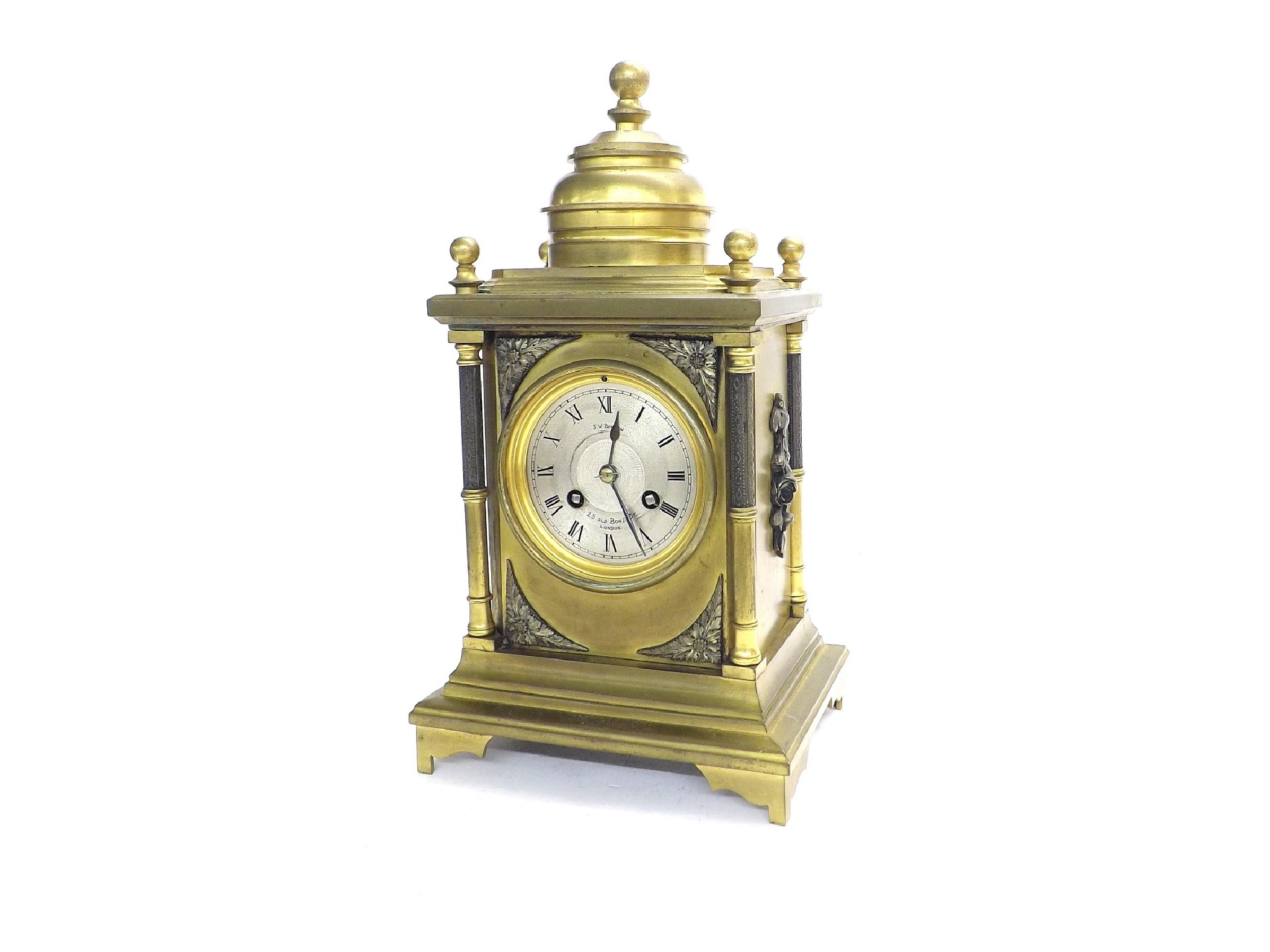 Appraisal: French brass two train mantel clock striking on a bell