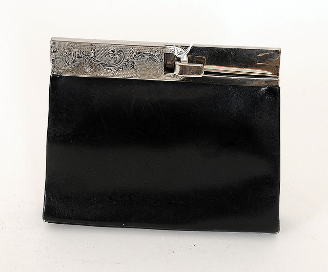 Appraisal: A s black leather clutch back with chrome panel to