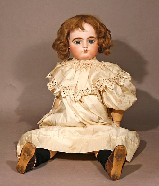 Appraisal: Bisque headed FG Doll Ball-jointed body measuring vintage clothing very