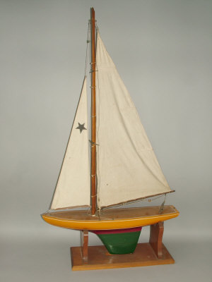 Appraisal: A th century fully rigged pond yacht with painted wooden