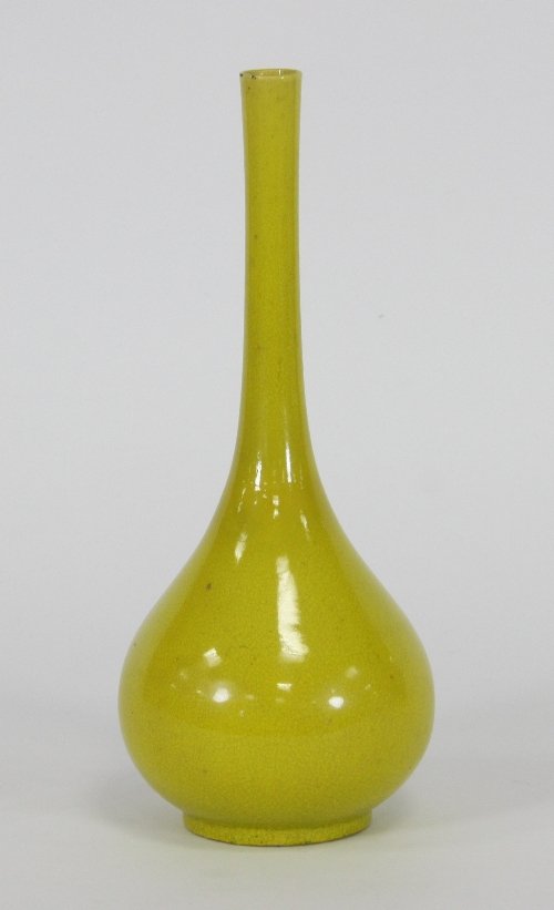 Appraisal: A Chinese yellow glazed vase of onion shape restored cm