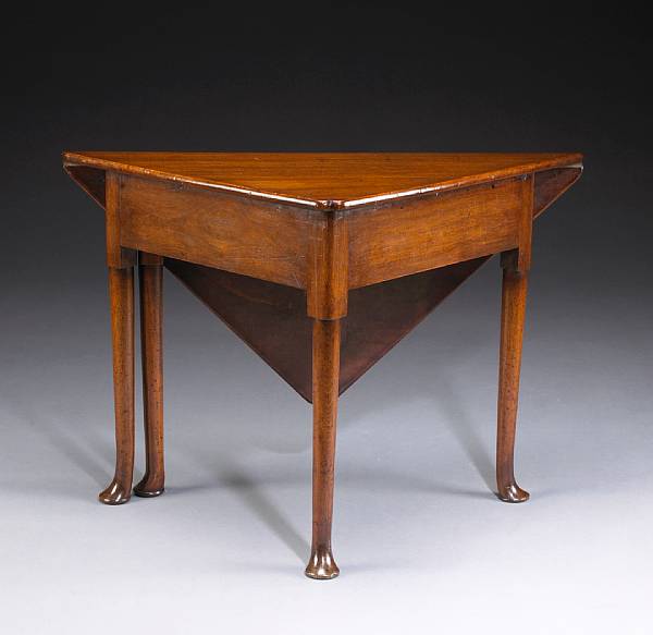 Appraisal: A George II mahogany corner drop leaf table mid th