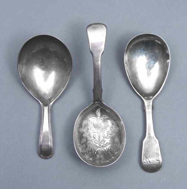 Appraisal: A GEORGE III SILVER CADDY SPOON fiddle pattern with pear