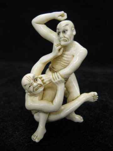 Appraisal: Carved Ivory Netsuke of Two Onimen fighting '' tall signed