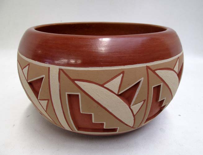 Appraisal: ROSITA DE HERRERA REDWARE BOWL having raised banded geometric sun