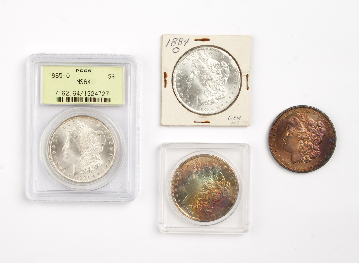 Appraisal: Four U S Morgan type silver dollars -' comprising MS-