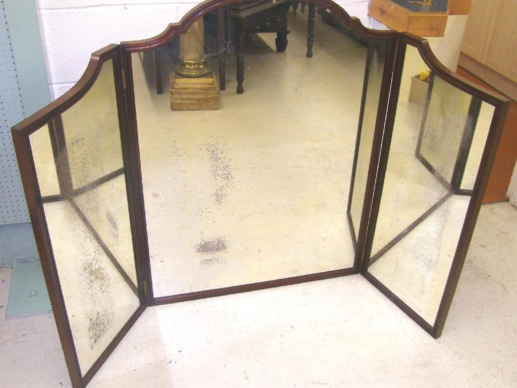 Appraisal: Good quality th century mahogany triple folding arch top mirror