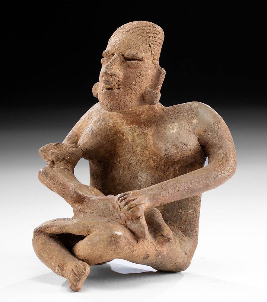 Appraisal: Jalisco Pottery Female Figure Nursing Child Originally Listed At Pre-Columbian