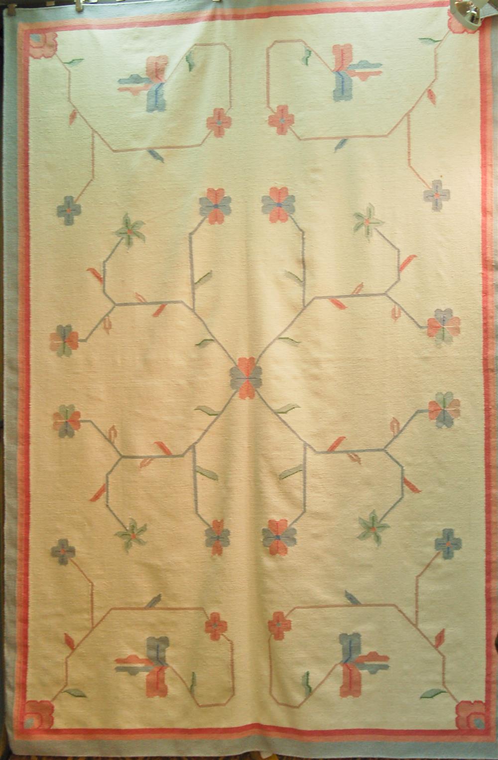 Appraisal: DHURRIE HAND WOVEN RUG reversible in a stylized floral design