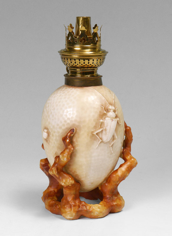 Appraisal: FIGURAL INSECT PORCELAIN OIL LAMP Stippled egg shaped body with