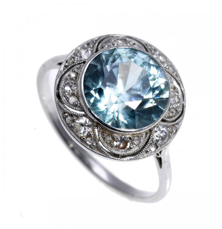 Appraisal: A BLUE ZIRCON AND DIAMOND CLUSTER RING the brilliant cut