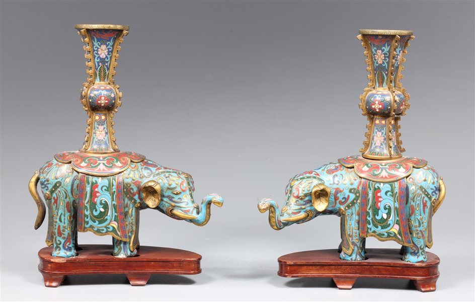 Appraisal: Pair of elaborate Chinese cloisonne elephant censors each saddled with