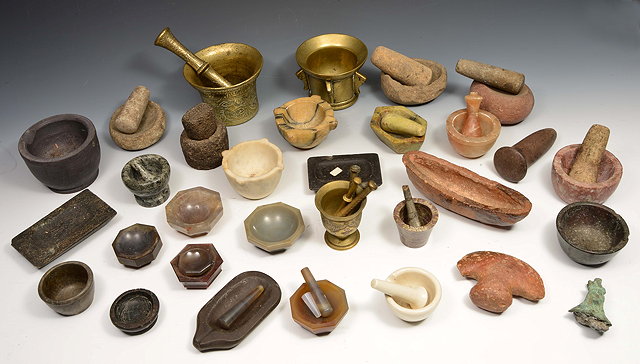 Appraisal: AN EXTENSIVE COLLECTION OF ANTIQUE MORTARS AND PESTLES including early