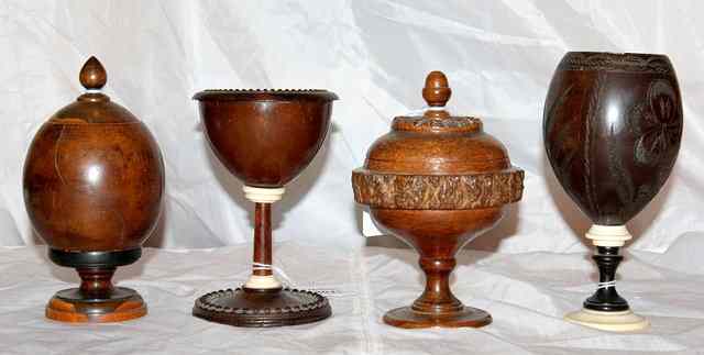 Appraisal: A GROUP OF FOUR TREEN COCONUT CUPS two with lids