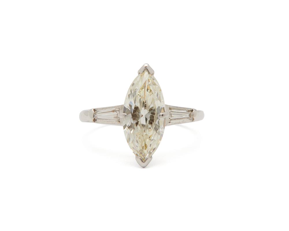 Appraisal: Platinum and Diamond Ring centering a marquise-cut diamond weighing approx