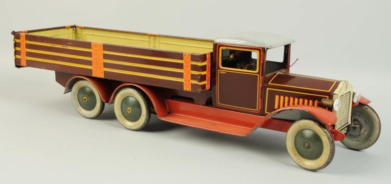 Appraisal: German Tin Litho Wind-Up Tippco Dump Truck Marked Dunlop Cord