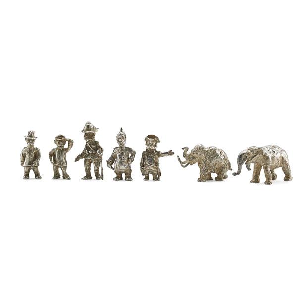 Appraisal: LANIER SILVER HISTORIC MINIATURES Seven pieces Elephant and Mammoth Teddy