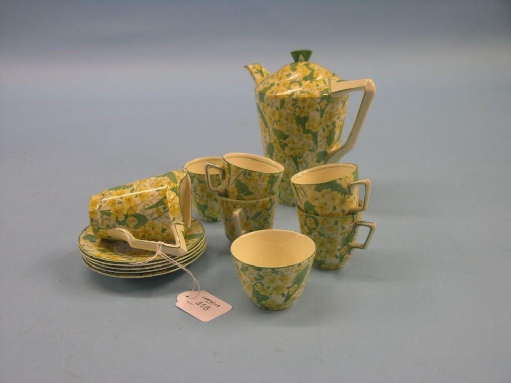 Appraisal: A Crown Ducal chintz-pattern coffee set five cups and saucers