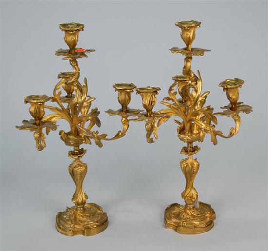 Appraisal: PAIR OF LOUIS XV STYLE GILT BRONZE FOUR LIGHT CANDELABRA