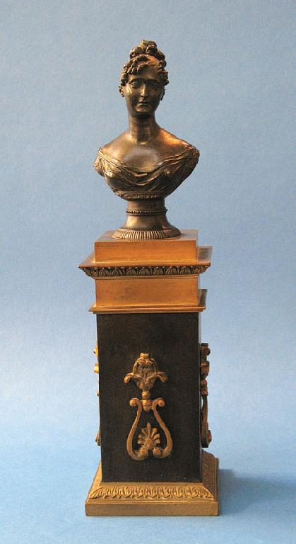 Appraisal: AN EARLY VICTORIAN BRONZE AND GILT METAL BUST of a