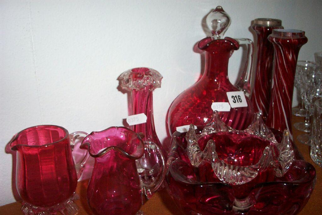 Appraisal: A collection of th century and other cranberry glassware including