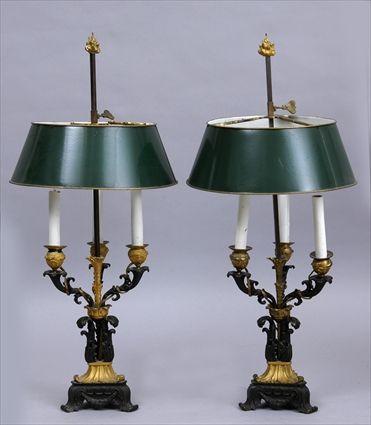 Appraisal: PAIR OF LOUIS-PHILLIPE BRONZE AND GILT-METAL THREE-LIGHT CANDELABRA MOUNTED AS