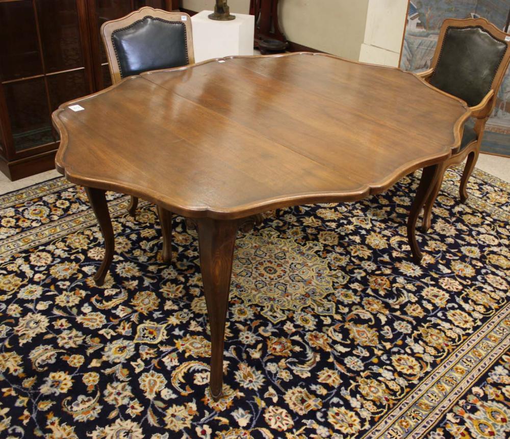 Appraisal: PROVINCIAL STYLE DINING TABLE WITH THREE LEAVES Thomasville Inc Watertown