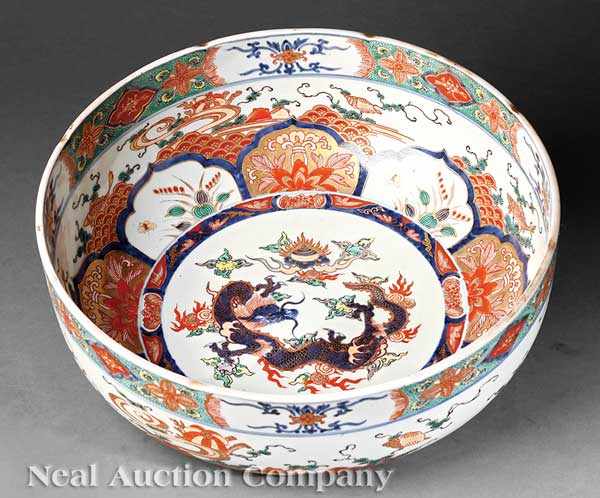 Appraisal: A Large Japanese Imari Porcelain Barbed Rim Bowl Meiji Period