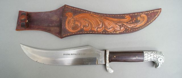 Appraisal: A large Bowie style knife inch blade marked original buffalo