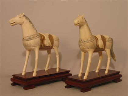 Appraisal: Pair of Carved Ivory Horses Japanese with stands one with