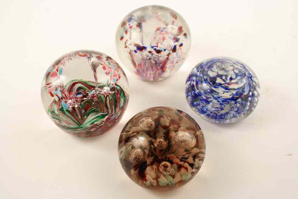 Appraisal: PAPERWEIGHT AND DOORSTOPS - Lot of four - possibly New