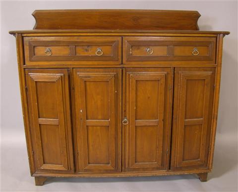 Appraisal: PROVINCIAL PINE PANELED BUFFET CABINET the molded top with backsplash