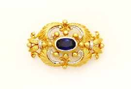 Appraisal: An ct gold openwork sapphire set brooch approximately x mm