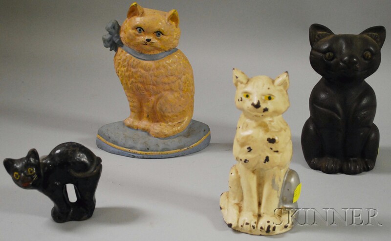 Appraisal: Four Painted Cast Iron Cat Doorstops ht to in