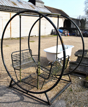 Appraisal: Painted Iron double swing seat on circular metal frame