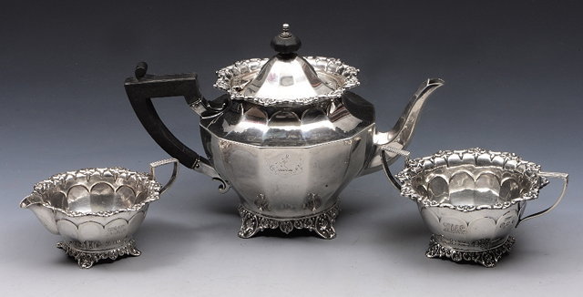 Appraisal: A SILVER THREE PIECE TEA SET the teapot with twelve