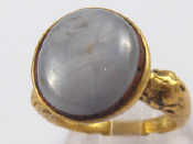 Appraisal: A gilt metal star sapphire ring possibly ancient sapphire approx