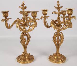 Appraisal: PAIR OF FRENCH BRONZE ORMOLU LIGHT CANDELABRA HAVING FLOWING TWIST