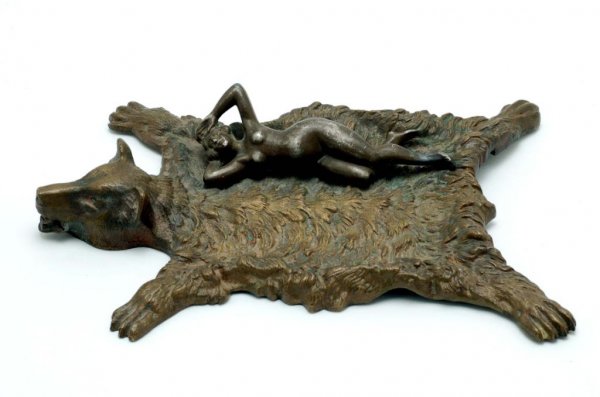 Appraisal: Rectangular cast bronze tray of a nude on a bear