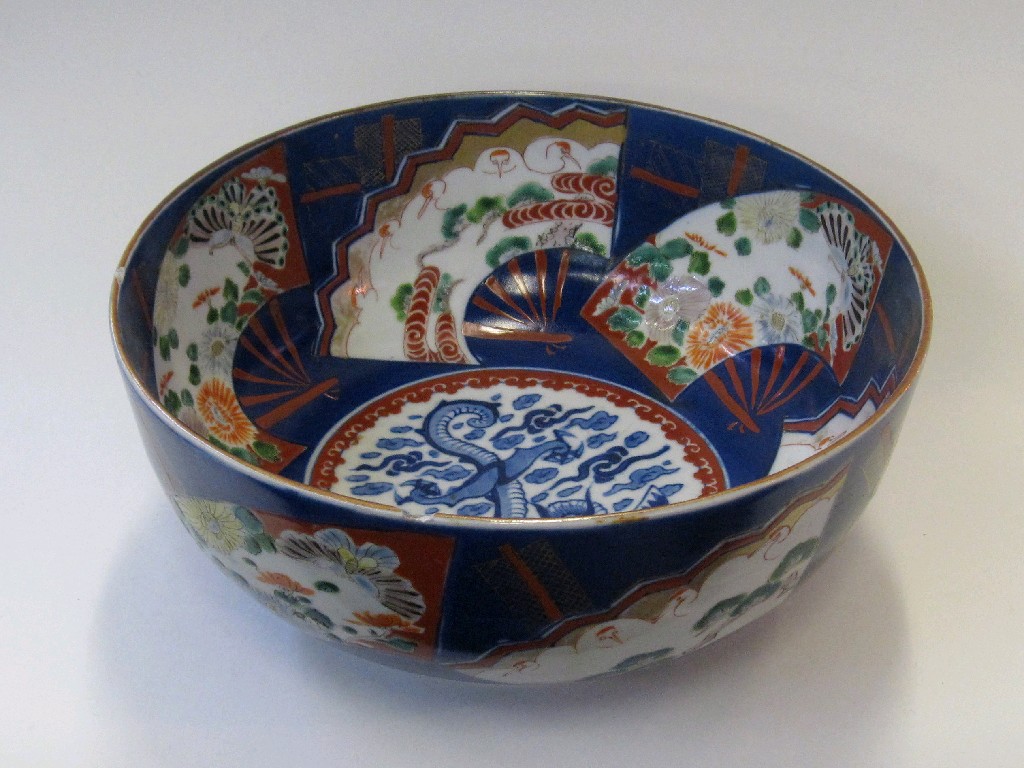 Appraisal: Oriental pottery bowl with fan shaped cartouches of painted decoration