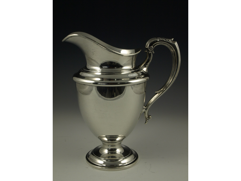 Appraisal: Sterling Silver Water Pitcher by Towle attractive urn form with