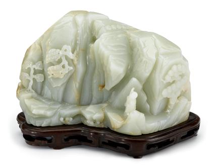 Appraisal: Chinese celadon jade mountain carving The jade boulder carved in