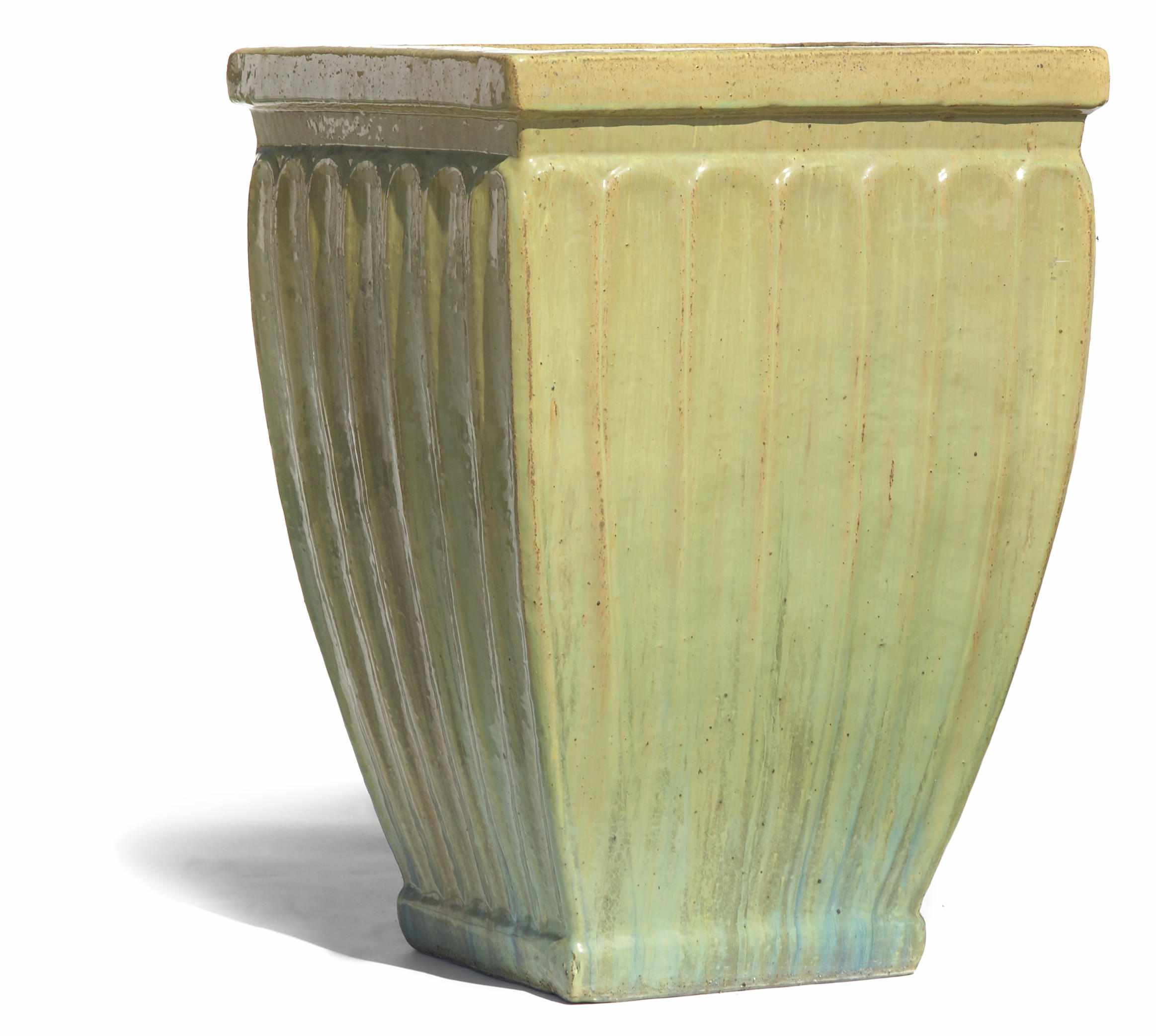 Appraisal: A pair of glazed earthenware jardinires height in cm width