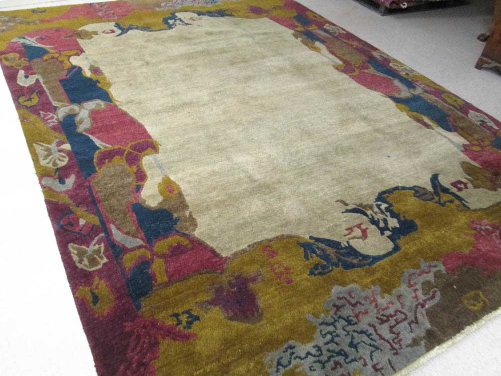 Appraisal: A CONTEMPORARY TUFENKIAN TIBETAN CARPET featuring an unadorned central camel